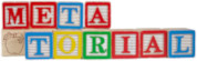 Learning letter blocks spelling out Metatorial - two rows